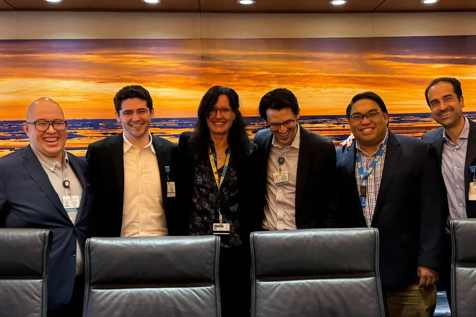 the six of the UVAS team members at the OPHAC presentation smiling in business casual attire