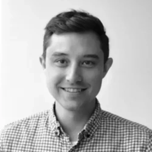 Headshot of Nicholas J. Jackson smiling in black and white.